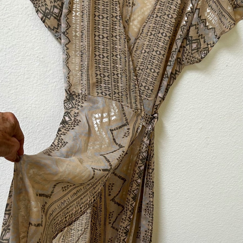 Boutique bought, never worn. Sheer beautiful wrap dress/or bathing suit cover